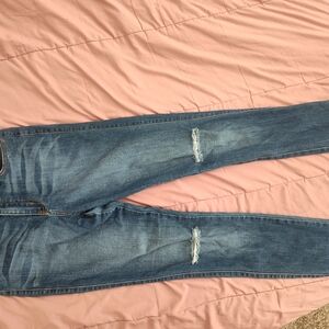 Vibrant Blue Skinny Jeans with Distressed Detailing